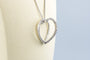 Collier Collier cœur en or blanc 18K et diamants 58 Facettes CL53500093-107