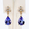 Boucles d'oreilles Boucles d'oreilles en or jaune, tanzanites et diamants 58 Facettes E011