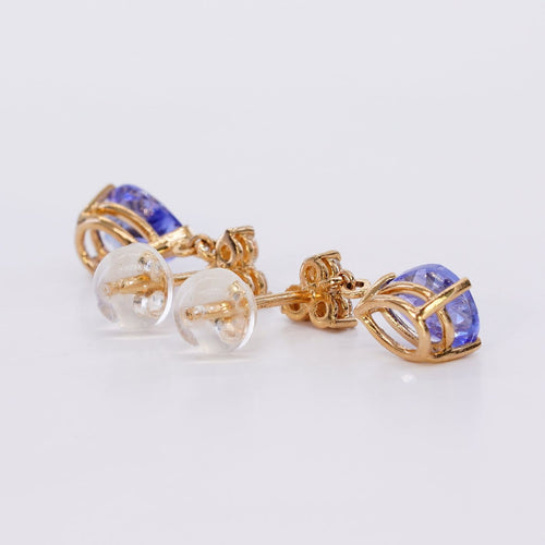 Boucles d'oreilles Boucles d'oreilles en or jaune, tanzanites et diamants 58 Facettes E011