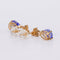 Boucles d'oreilles Boucles d'oreilles en or jaune, tanzanites et diamants 58 Facettes E011