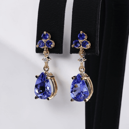 Boucles d'oreilles Boucles d'oreilles en or jaune 14 ct, tanzanites, saphirs et diamants 58 Facettes E012