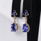 Boucles d'oreilles Boucles d'oreilles en or jaune 14 ct, tanzanites, saphirs et diamants 58 Facettes E012