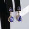 Boucles d'oreilles Boucles d'oreilles en or jaune 14 ct, tanzanites, saphirs et diamants 58 Facettes E012
