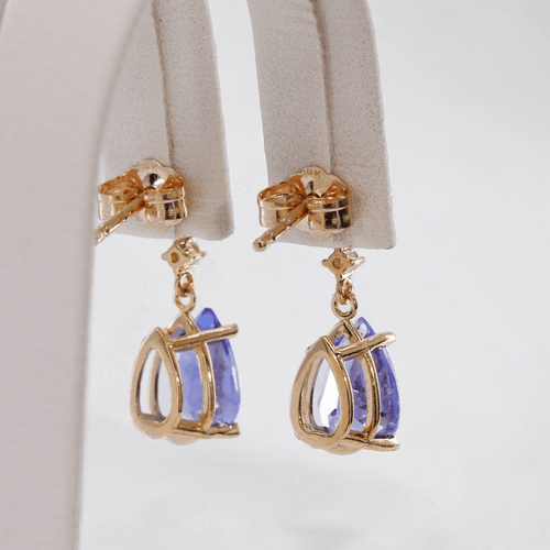 Boucles d'oreilles Boucles d'oreilles en or jaune 14 ct, tanzanites, saphirs et diamants 58 Facettes E012