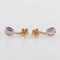 Boucles d'oreilles Boucles d'oreilles en or jaune 14 ct, tanzanites, saphirs et diamants 58 Facettes E012