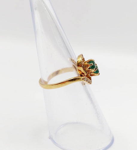 Bague 48 Bague tourbillon Toi et Moi en or 18k, émeraudes et diamants 58 Facettes A07221