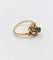 Bague 48 Bague tourbillon Toi et Moi en or 18k, émeraudes et diamants 58 Facettes A07221