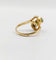 Bague 48 Bague tourbillon Toi et Moi en or 18k, émeraudes et diamants 58 Facettes A07221