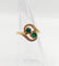 Bague 48 Bague tourbillon Toi et Moi en or 18k, émeraudes et diamants 58 Facettes A07221