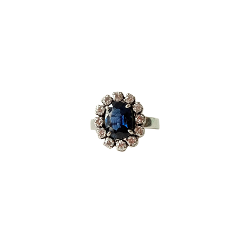 Bague marguerite vers 1960 en or blanc, saphir et diamants