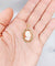 Pendentif Pendentif vintage en or 18k, camée jeune femme sur coquillage 58 Facettes A07229