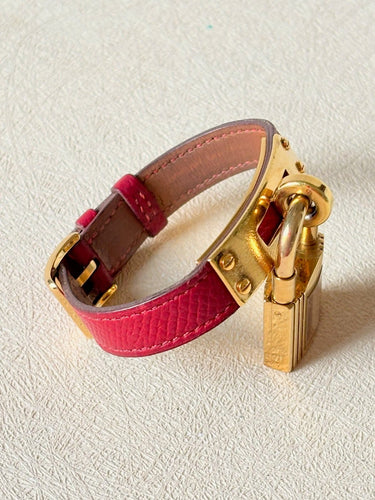 Montre Hermès Kelly - Montre cadenas en plaqué or et cuir 58 Facettes WC-2025-1806