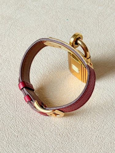 Montre Hermès Kelly - Montre cadenas en plaqué or et cuir 58 Facettes WC-2025-1806