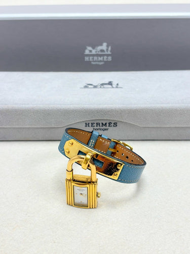 Montre Hermès Kelly - Montre en plaqué or et cuir rouge 58 Facettes WC-2025-3238