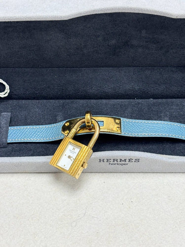 Montre Hermès Kelly - Montre en plaqué or et cuir rouge 58 Facettes WC-2025-3238