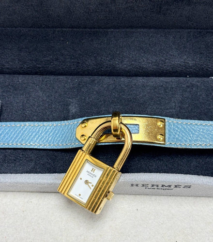 Montre Hermès Kelly - Montre en plaqué or et cuir rouge 58 Facettes WC-2025-3238