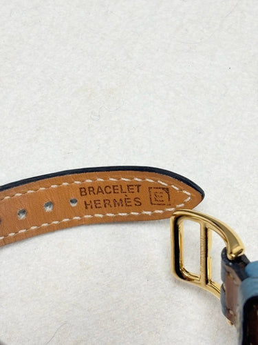 Montre Hermès Kelly - Montre en plaqué or et cuir rouge 58 Facettes WC-2025-3238