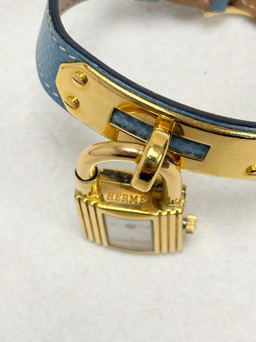 Montre Hermès Kelly - Montre en plaqué or et cuir rouge 58 Facettes WC-2025-3238