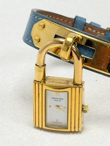 Montre Hermès Kelly - Montre en plaqué or et cuir rouge 58 Facettes WC-2025-3238