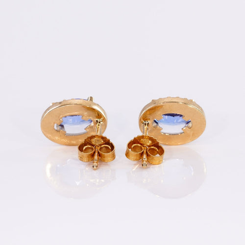 Boucles d'oreilles Boucles d'oreilles en or jaune 18 ct, tanzanites et diamants 58 Facettes E013