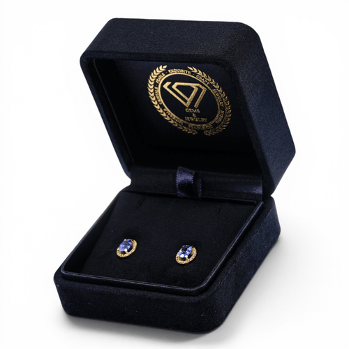 Boucles d'oreilles Boucles d'oreilles en or jaune 18 ct, tanzanites et diamants 58 Facettes E013