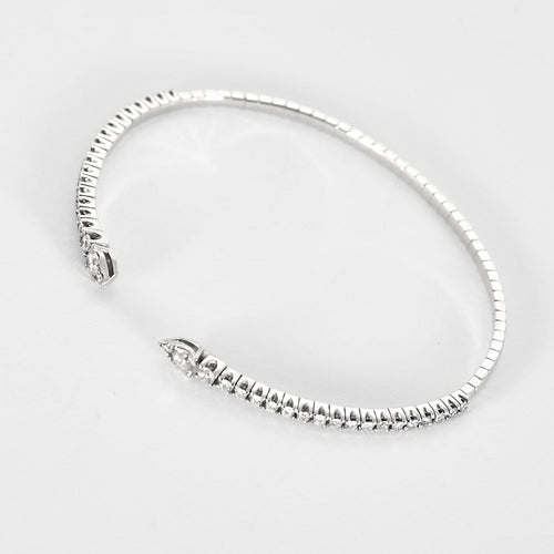 Bracelet Bracelet jonc flexible en or blanc et diamants 58 Facettes P11L6