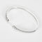 Bracelet Bracelet jonc flexible en or blanc et diamants 58 Facettes P11L6