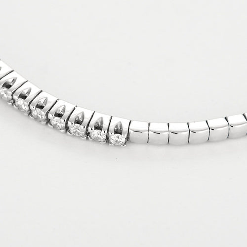 Bracelet Bracelet jonc flexible en or blanc et diamants 58 Facettes P11L6