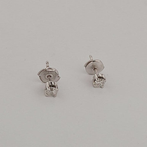 Boucles d'oreilles Boucles d'oreilles puces en or blanc et brillants 58 Facettes 2090738
