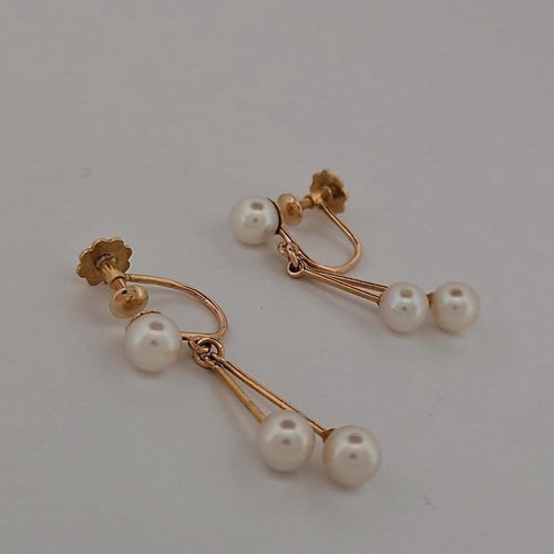 Boucles d'oreilles Boucles d'oreilles pendantes en or jaune et perles de culture 58 Facettes 3042170