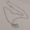 Collier Collier en or blanc avec aigue-marine cœur 58 Facettes 3042149