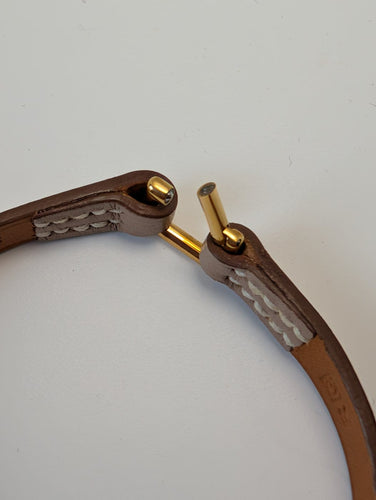 Bracelet Hermès Kelly Mini - Bracelet en plaqué or et cuir 58 Facettes 1220