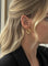 Boucles d'oreilles Boucles d'oreilles torsadées en or jaune 18 carats 58 Facettes N53