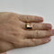 https://api-ledial.emberware.it/app/uploads/2025/11/36431-anello-oro-uomo-scudo-rubini_indossato_sito.jpg