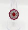 Bague 53.5 Bague marguerite vintage en or blanc, rubis et diamants 58 Facettes A07261
