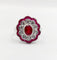 Bague 53.5 Bague marguerite vintage en or blanc, rubis et diamants 58 Facettes A07261