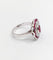 Bague 53.5 Bague marguerite vintage en or blanc, rubis et diamants 58 Facettes A07261