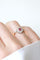 Bague 52.5 Bague marguerite ancienne en or rose, platine, rubis birman et diamants 58 Facettes