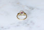 Bague 52.5 Bague marguerite ancienne en or rose, platine, rubis birman et diamants 58 Facettes