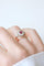 Bague 52.5 Bague marguerite ancienne en or rose, platine, rubis birman et diamants 58 Facettes