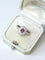 Bague 52.5 Bague marguerite ancienne en or rose, platine, rubis birman et diamants 58 Facettes