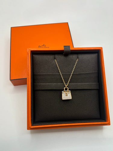 Collier Hermès Sac Birkin - Collier en or rose 18K et diamants 58 Facettes 1963