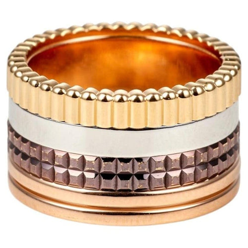 Bague 50 Boucheron Quatre - Bague en ors 18 carats et PVD marron 58 Facettes 195