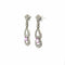 Boucles d'oreilles Imperial Elegance - Boucles d'oreilles en platine, diamants et saphirs roses 58 Facettes 50467