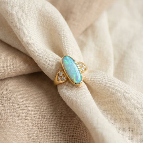 Bague 52 Bague en or jaune 18 carats, opale boulder et diamants 58 Facettes