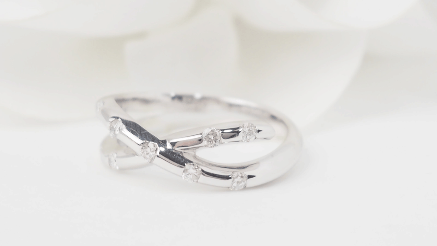 Bague 50 Bague croisée en or blanc 18k et diamants 58 Facettes 30472