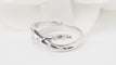 Bague 50 Bague croisée en or blanc et diamants 58 Facettes 30472