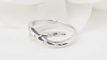 Bague 50 Bague croisée en or blanc 18k et diamants 58 Facettes 30472