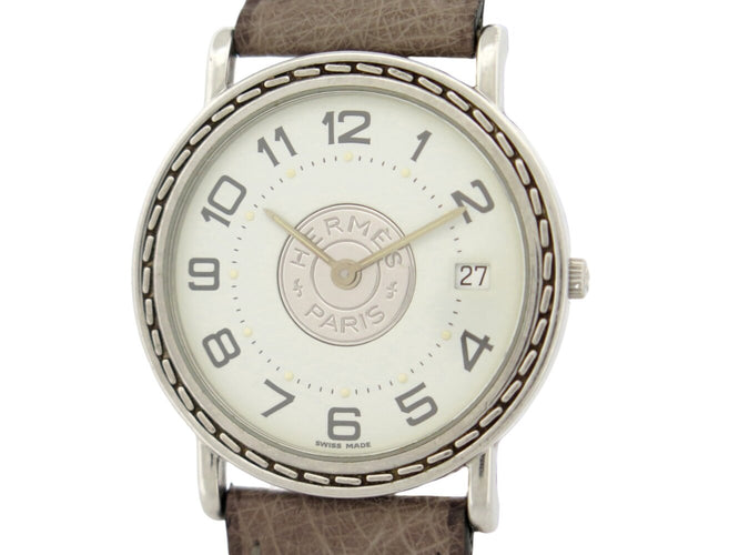 Montre Hermès Sellier - Montre 32 mm en acier et cuir autruche 58 Facettes 275124