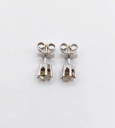 Puces d'oreilles vintage en or blanc et diamants cognac 58 Facettes A07310
